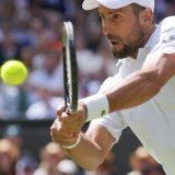 Novak Djokovic: un succès un peu laborieux jeudi à Wimbledon KEYSTONE/AP/Kirsty Wigglesworth